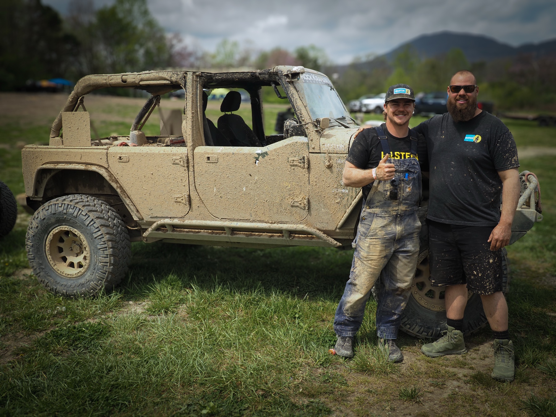 ABO crew post-race with the mud-covered Jeep at Terra Trophy